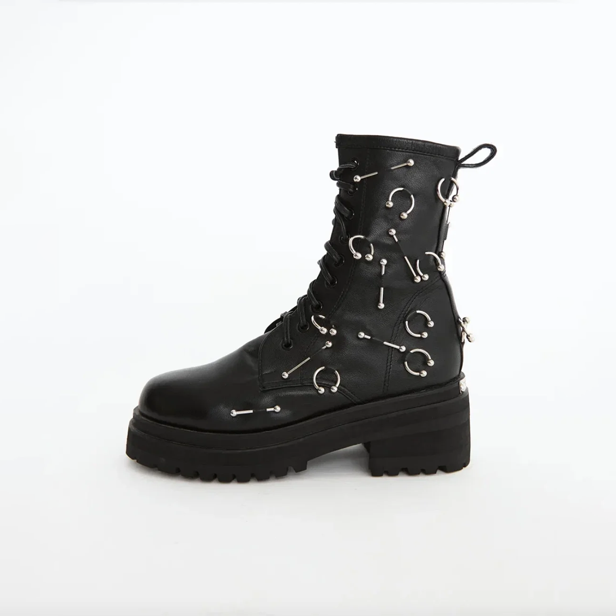 Boots with piercing decoration in a daring style