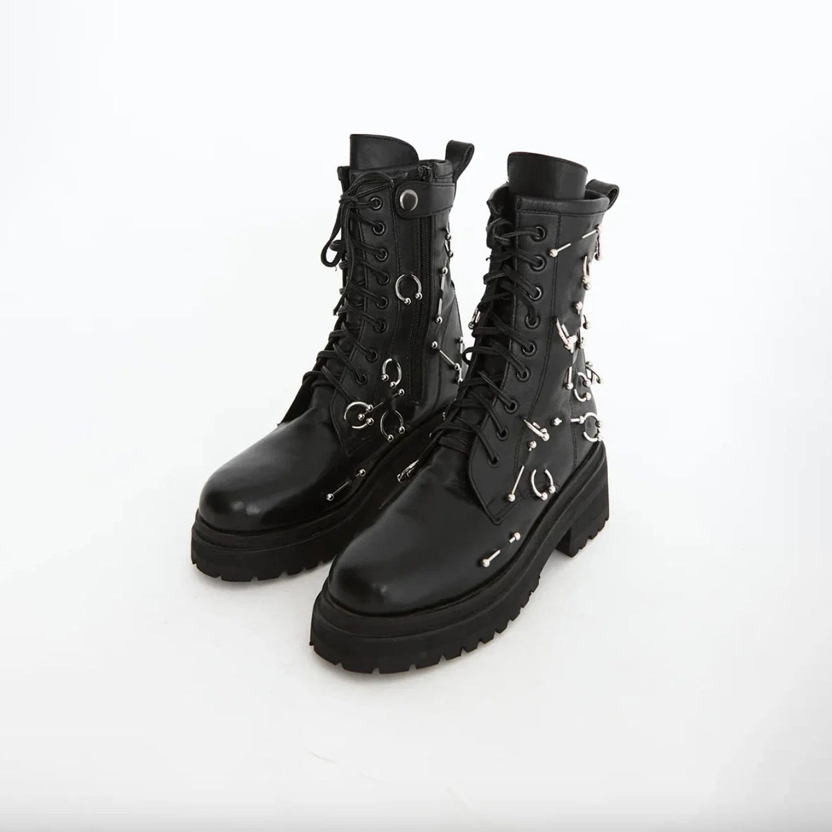 Boots with piercing decoration in a daring style