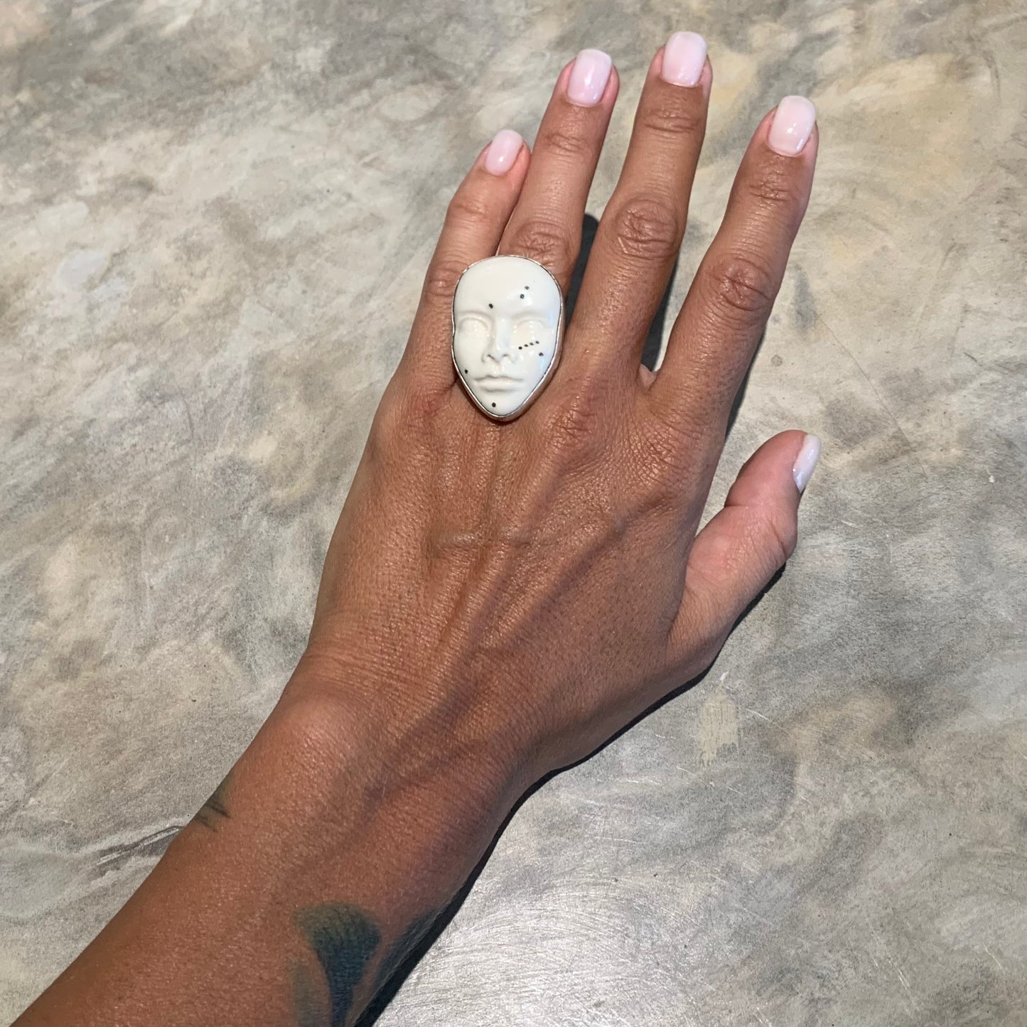 Dot face ring