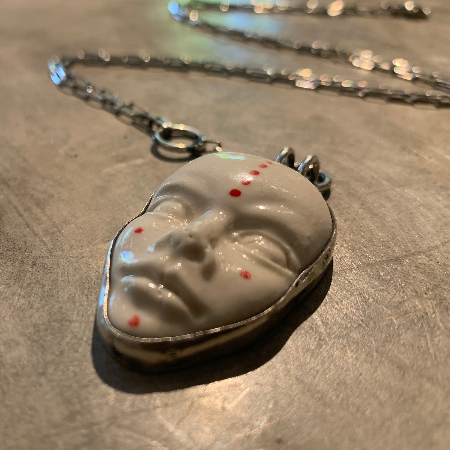 Pride face necklace (silver)