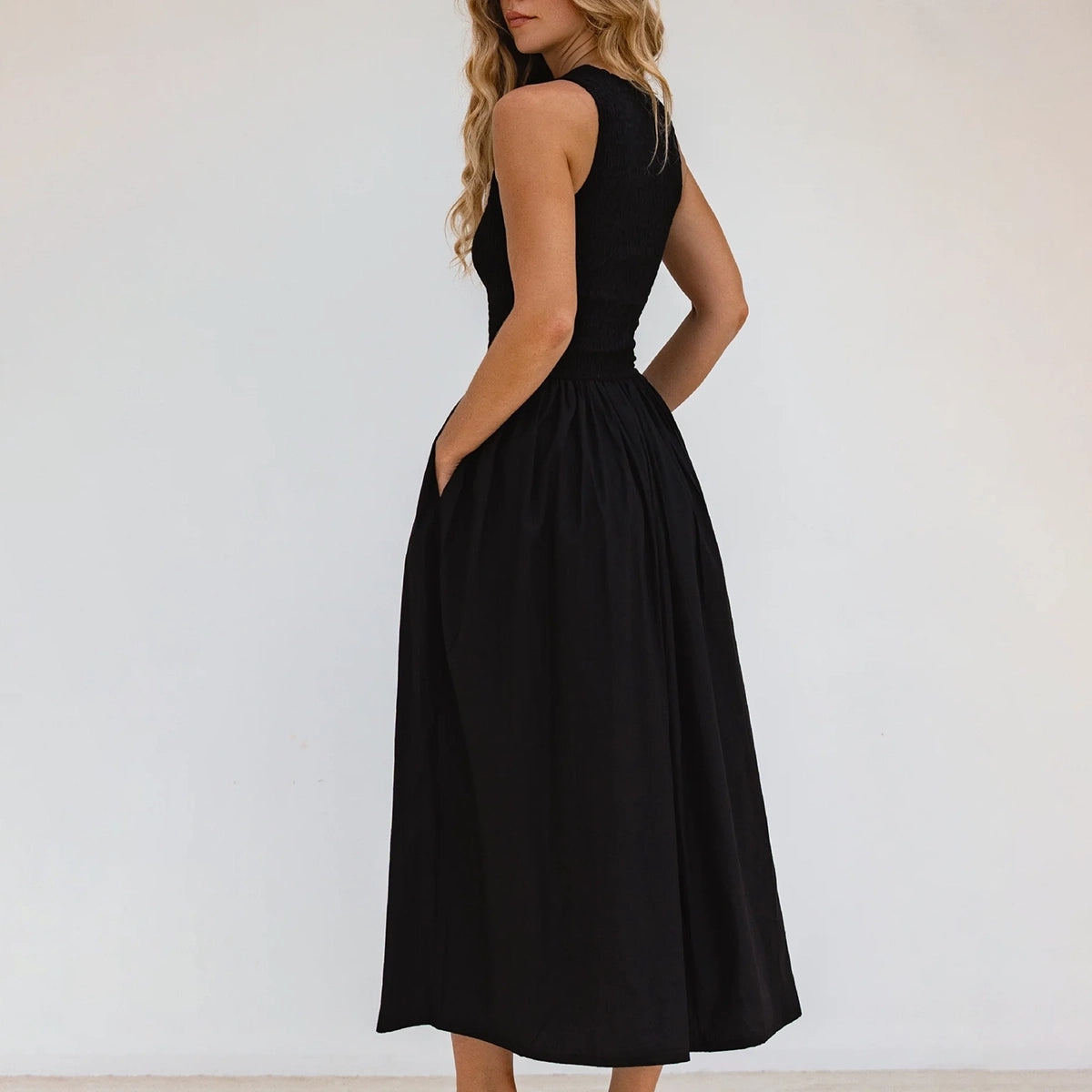 Lucciola Smocked Cotton Midi Dress In Black