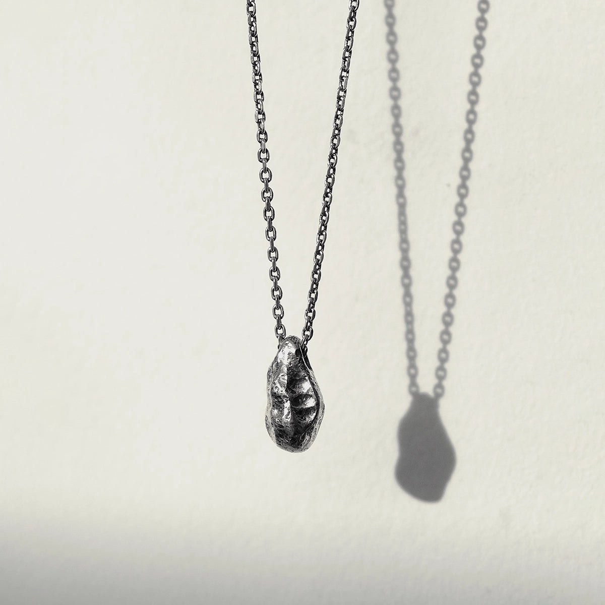 THE STONE NECKLACE