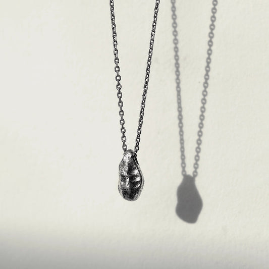 THE STONE NECKLACE