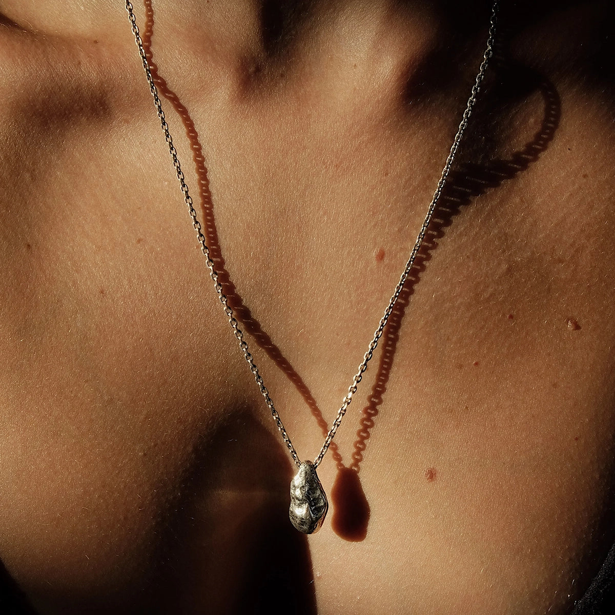 THE STONE NECKLACE