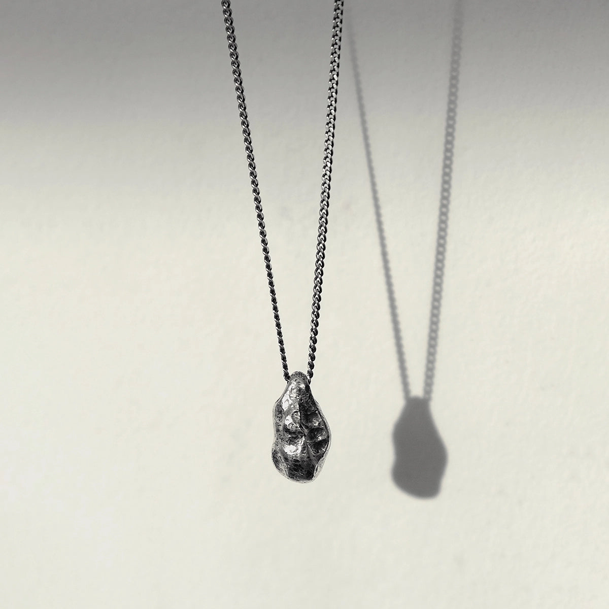 THE STONE NECKLACE
