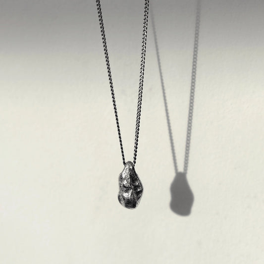 THE STONE NECKLACE