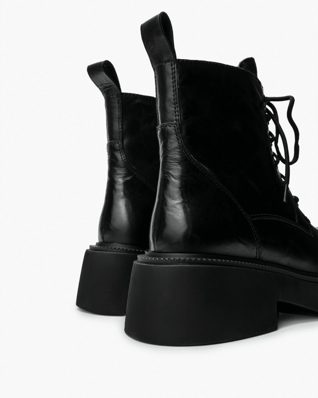 Black vintage leather boots, rear construction detail