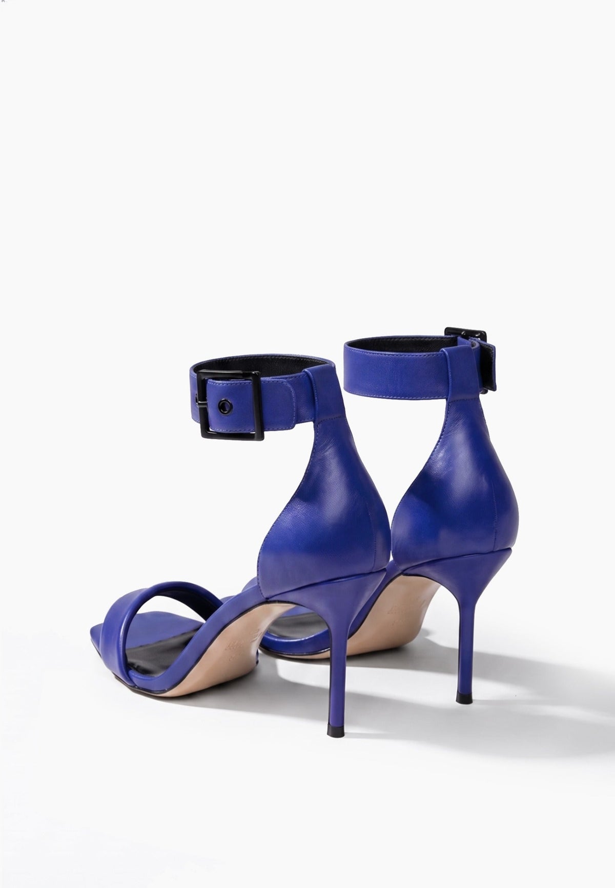 Rear view of cobalt blue genuine leather stiletto heels