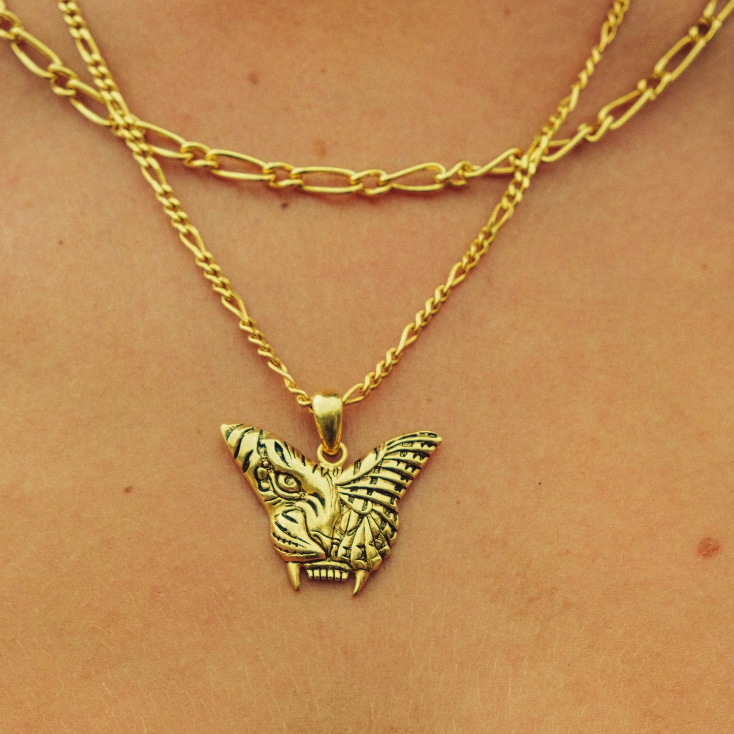 Tiger butterfly pendant in gold