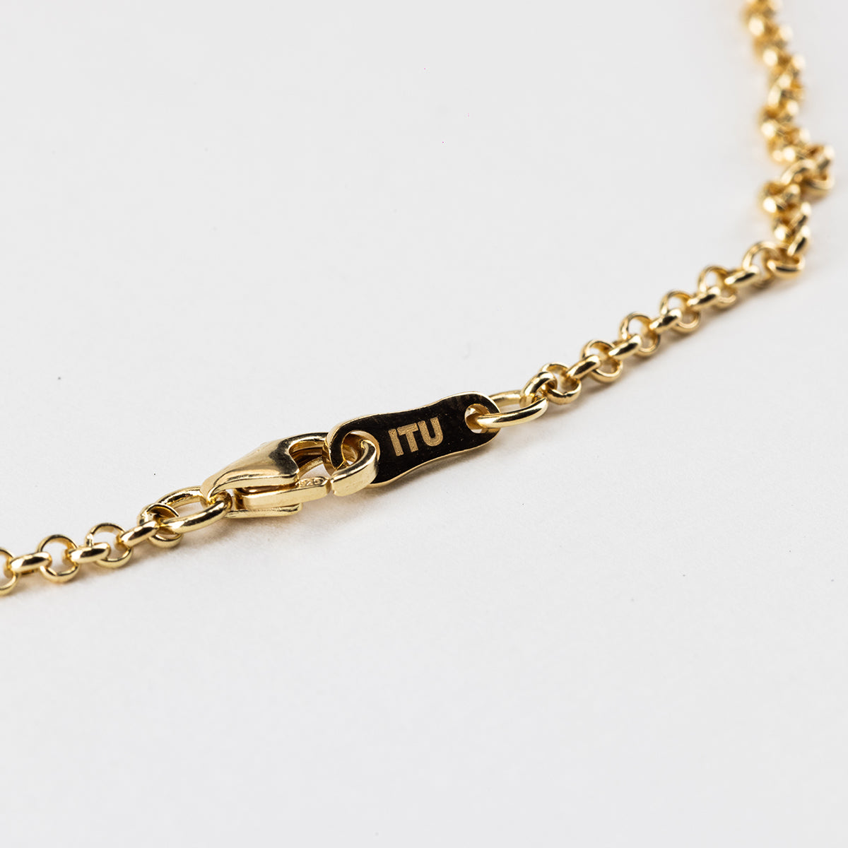 PYRITE CROSS NECKLACE IN GOLD