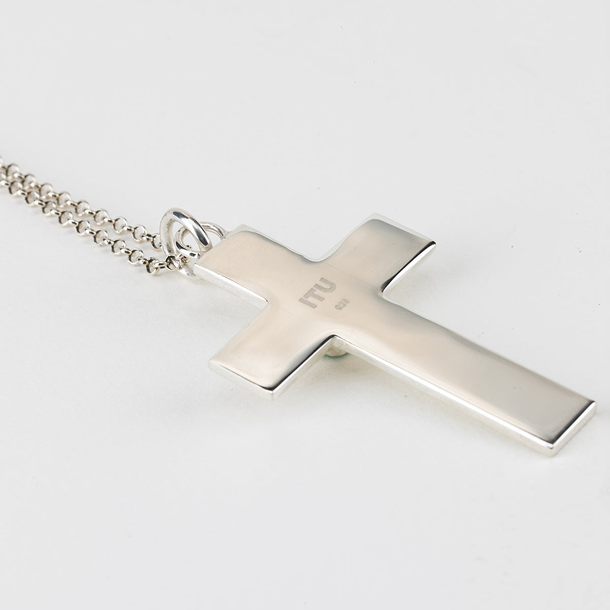 EMERALD CROSS NECKLACE IN SILVER