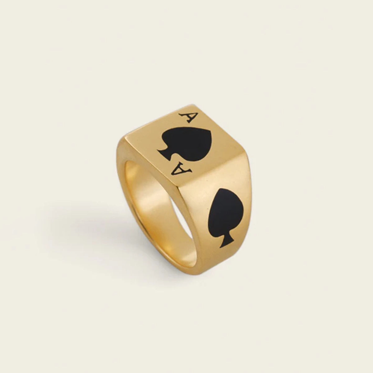 CARD RING WITH BLACK STONE IN GOLD