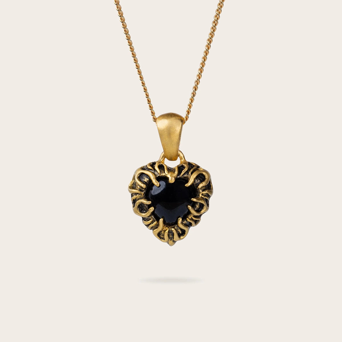 FLAME HEART PENDANT IN GOLD