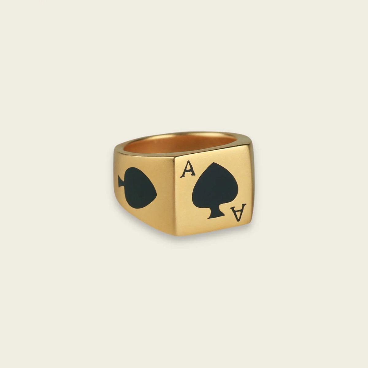 CARD RING WITH BLACK STONE IN GOLD