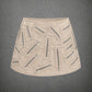 ZIPPER MINI SKIRT IN BEIGE