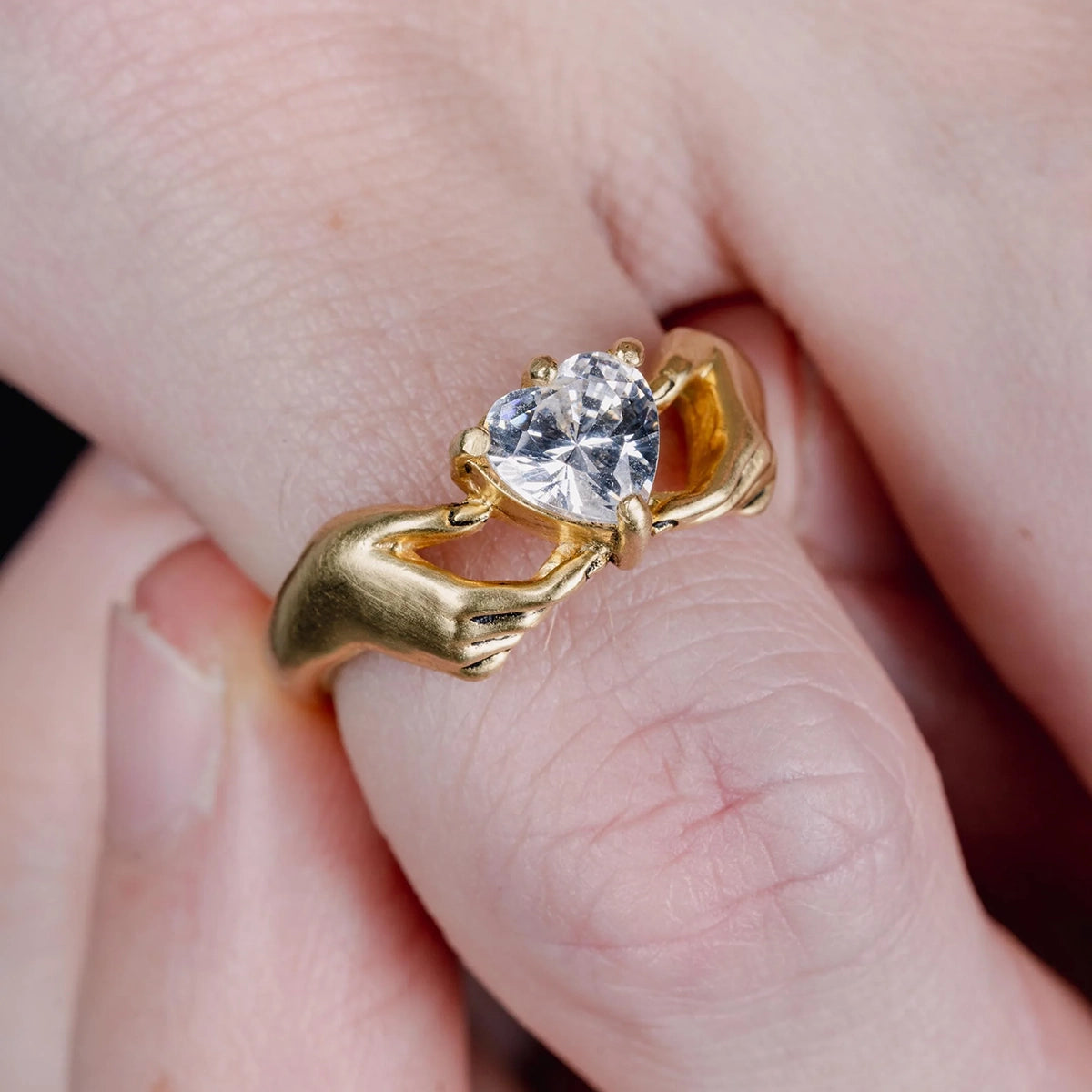 BLUE STONE HAND RING IN GOLD