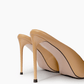 Nude stiletto mule heel and black heel-tip detail