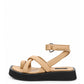 Warm beige leather toe-loop platform sandal with crossover straps and black sole, side profile