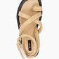 Top view of beige leather platform sandal with padded straps and adjustable ankle closure