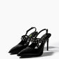 Pair of black pointed slingback heels with crystal straps