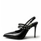 Black leather crystal-strap slingback heels with pointed toe, side view
