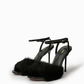 Pair of black natural fur ankle-strap high heel sandals