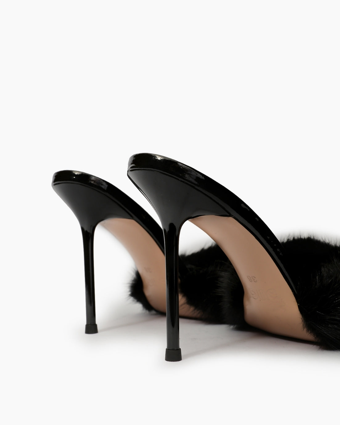Black fur mule heels, high stiletto detail