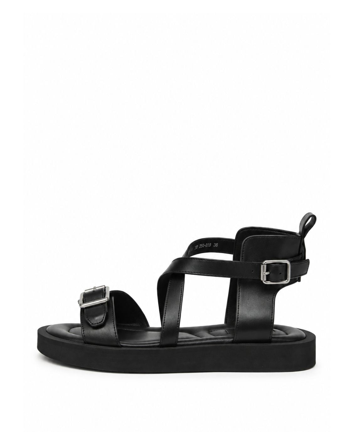 Black leather harness sandals with two silver-tone buckles and low platform, side profile
