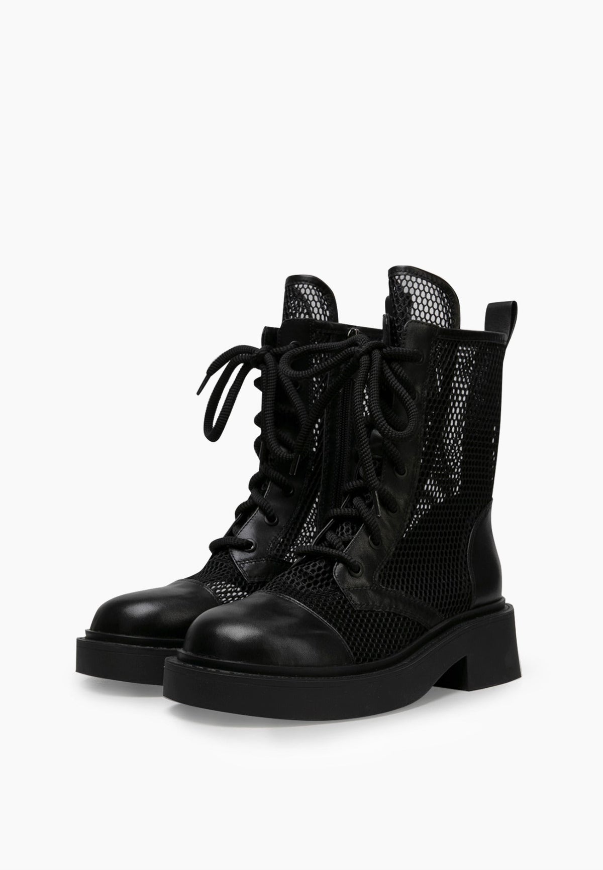 Pair of black lace-up mesh combat boots with leather toe caps and chunky soles