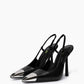 Pair of black genuine leather slingback heels with polished silver-tone pointed toe caps