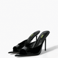 Pair of black genuine patent leather pointed-footbed mules