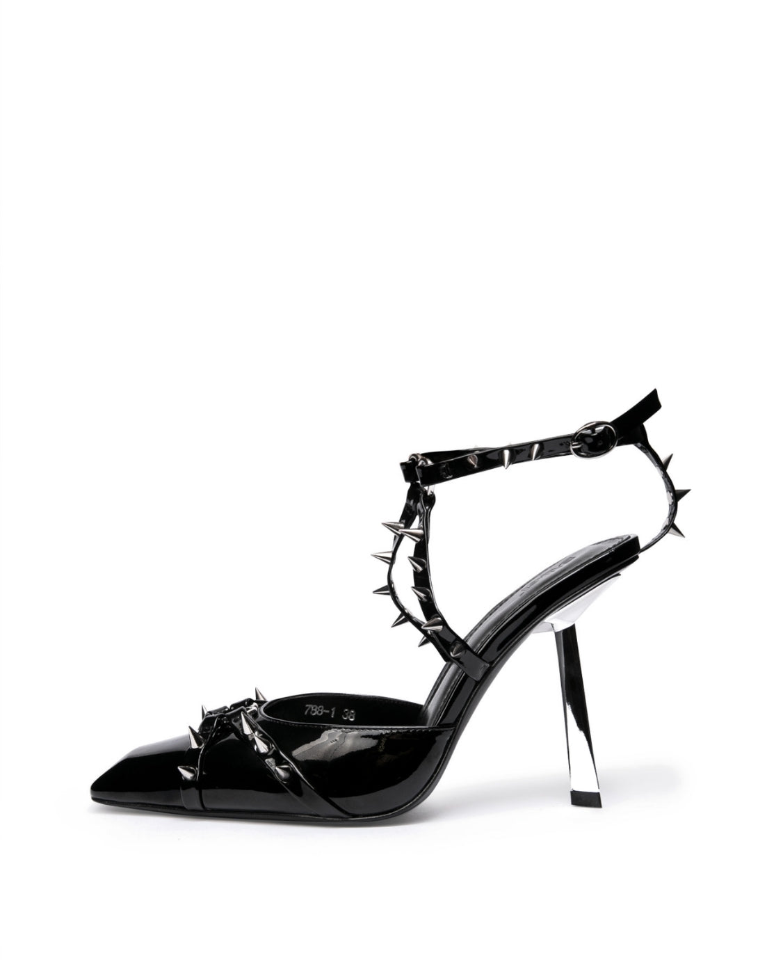 Black patent leather heels with silver-tone spikes and a sculptural silver-tone heel — side view