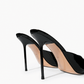 Black patent leather mules, stiletto heel and sole detail