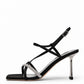 Black satin glitter-strap heels, side view