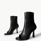 Black stretch-leather ankle boots with side zip