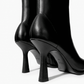Black stretch-leather ankle boots with high flared heel