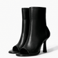 Pair of black genuine stretch-leather peep-toe ankle boots