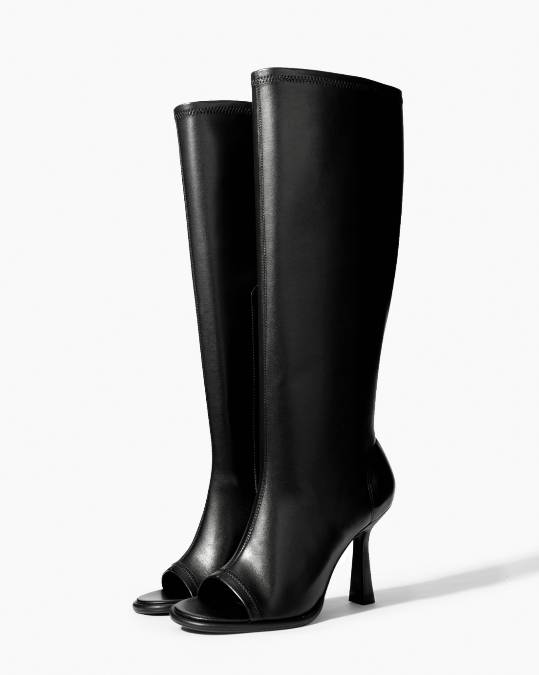 Pair of black stretch microfiber leather open-toe knee boots