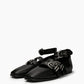 Pair of black leather ballet flats with square toes and silver-tone buckle straps
