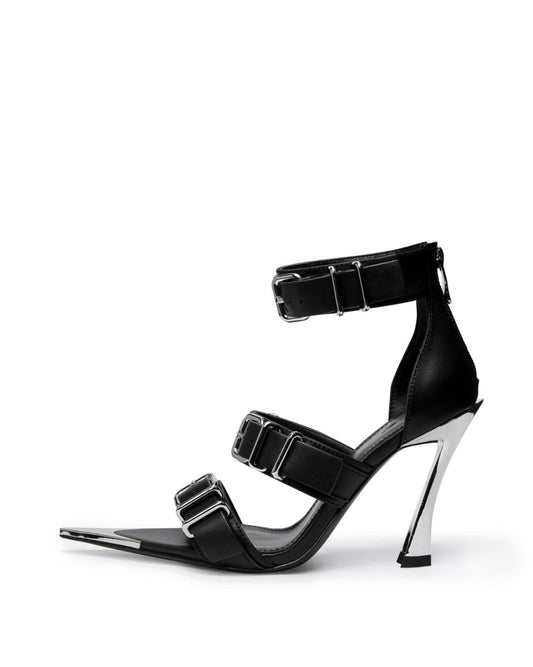 Black leather triple-buckle heels with chrome-coated pointed toe and sculptural high heel, side view