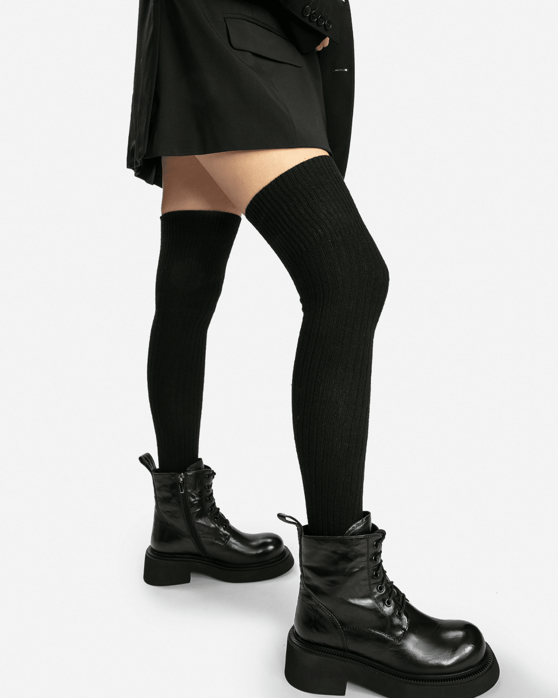 Black vintage leather boots styled on model