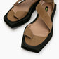 Close-up of camel suede crossover straps, leather insole and square toe