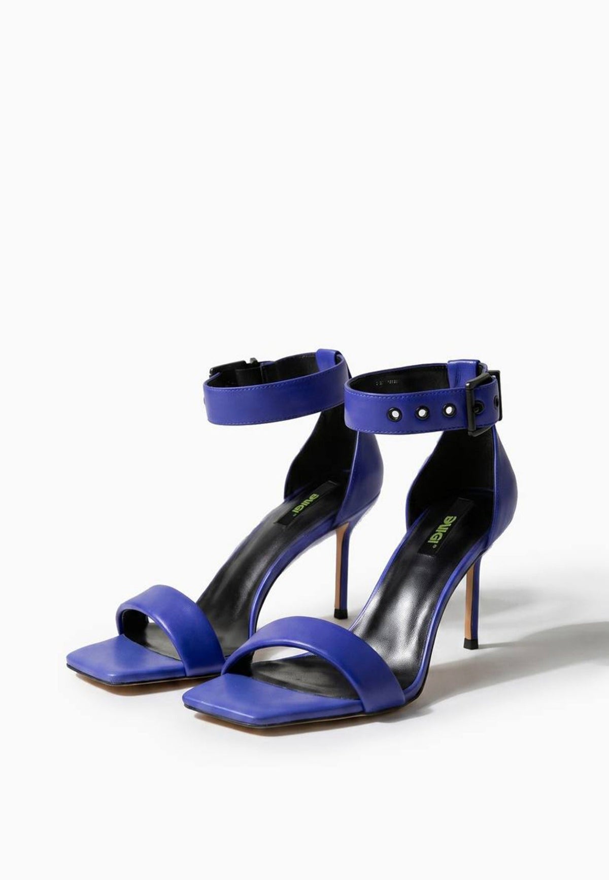 Pair of cobalt blue genuine leather heels with black buckles