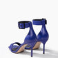 Rear view of cobalt blue genuine leather stiletto heels