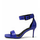 Cobalt blue genuine leather heels with wide ankle cuff, side view