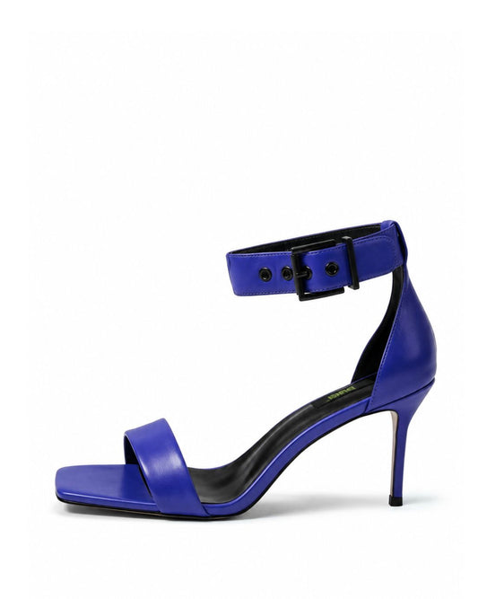 Cobalt blue genuine leather heels with wide ankle cuff, side view