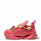 Coral pink chunky sneakers with beige rope laces and sculpted sole, side view