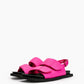 Pair of fuchsia pink leather comfort sandals with black flat soles