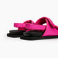 Rear view of hot pink leather sandals with adjustable heel straps