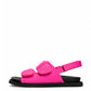 Hot pink soft leather double-strap sandals with adjustable padded straps, side view